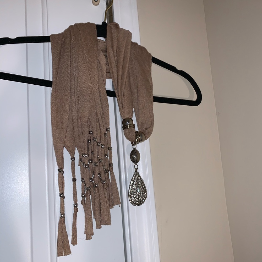 Scarf with decorations